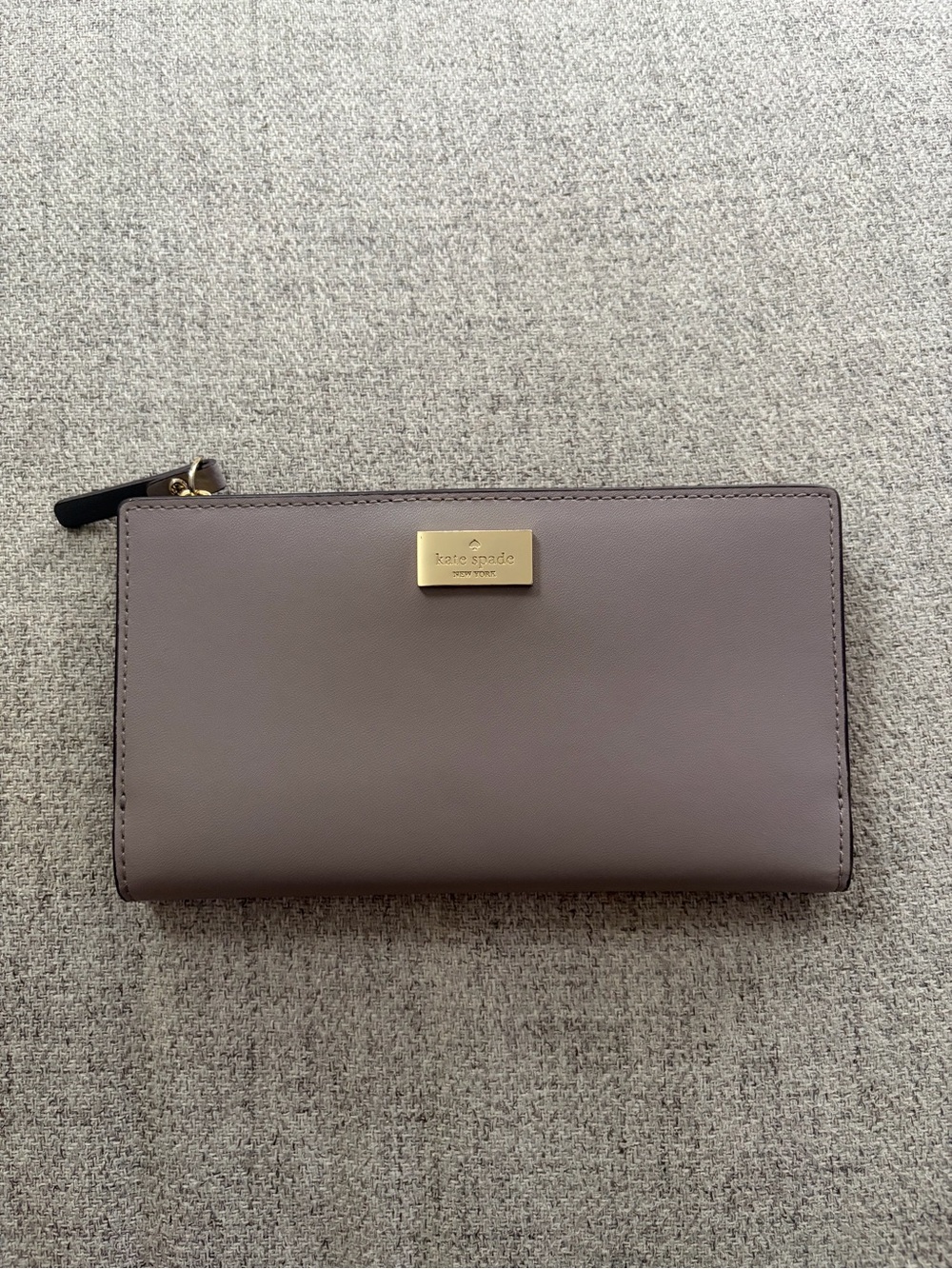 kate spade mauve taupe leather zip-around wallet with gold plaque